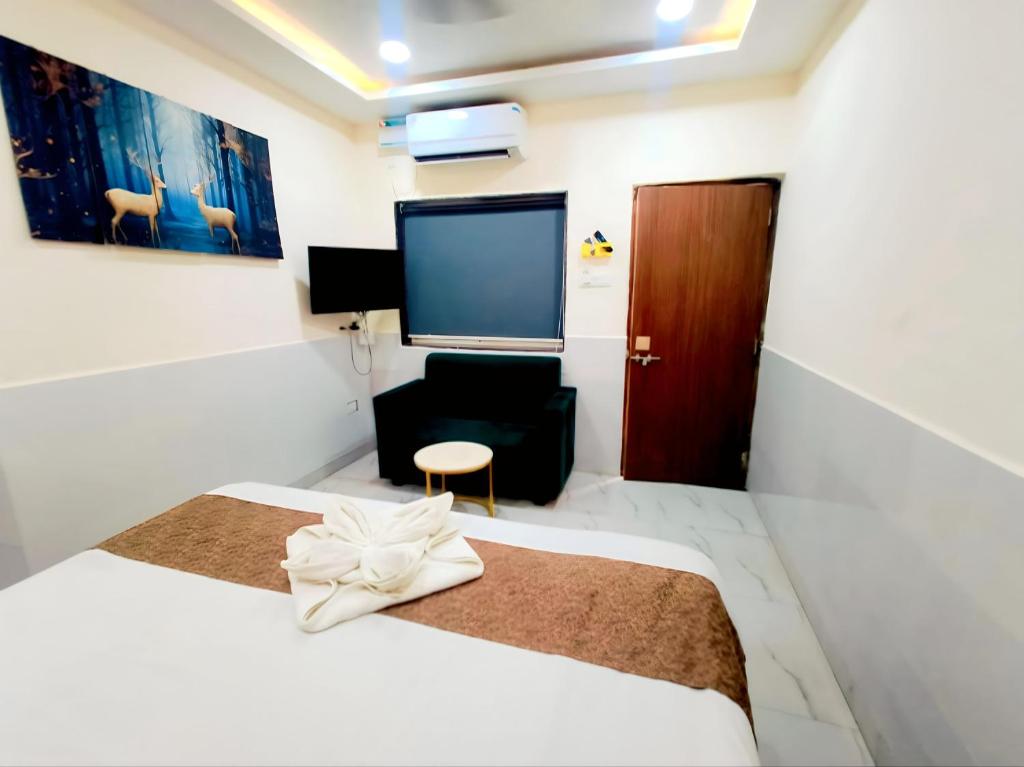 Postel nebo postele na pokoji v ubytování Hotel Small Daddy Plus