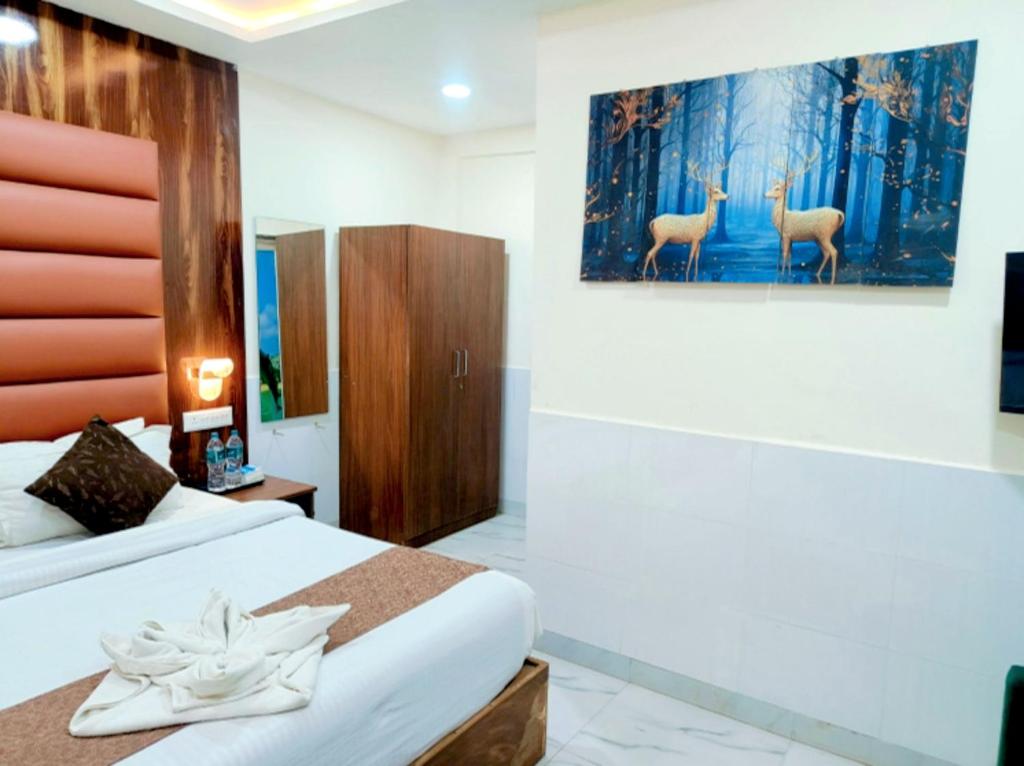 Postel nebo postele na pokoji v ubytování Hotel Small Daddy Plus