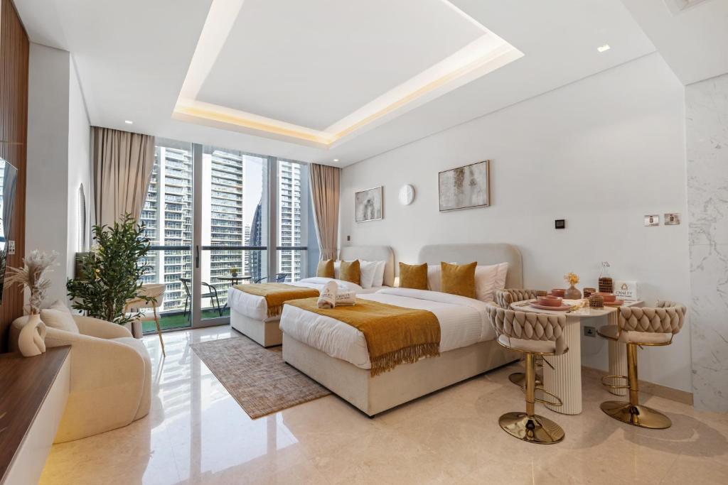 Ein Bett oder Betten in einem Zimmer der Unterkunft Chalet Homes - LUX New Studio With 2 Double Beds in Downtown Dubai
