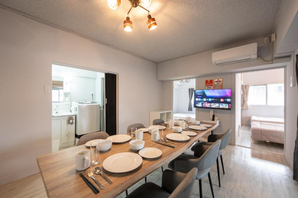 TV a/nebo společenská místnost v ubytování GoodStay301