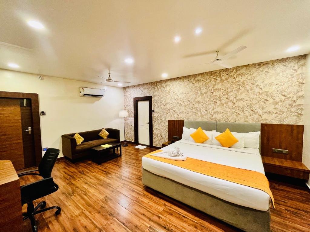 Postel nebo postele na pokoji v ubytování Shankar Bhavan By Vinayak Hotels