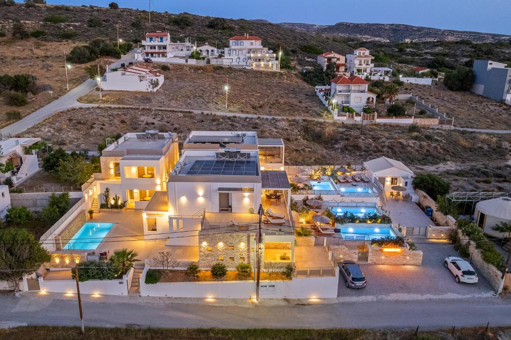 The swimming pool at or close to Ammokrinos Luxury Homes, 150m From Sea