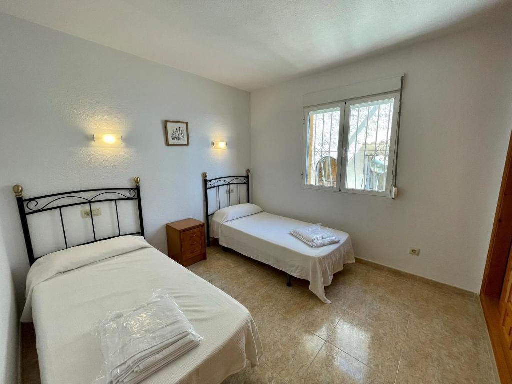 Postel nebo postele na pokoji v ubytování Apartamento Panorama X0089 - Salco la Cumbre