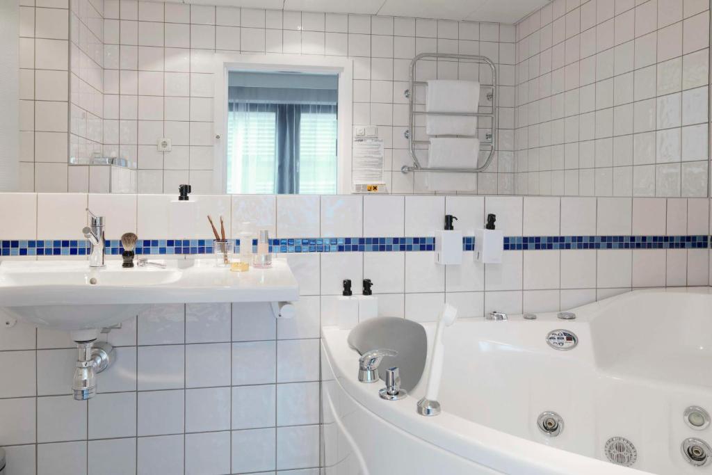 Koupelna v ubytování Scandic Sjöfartshotellet