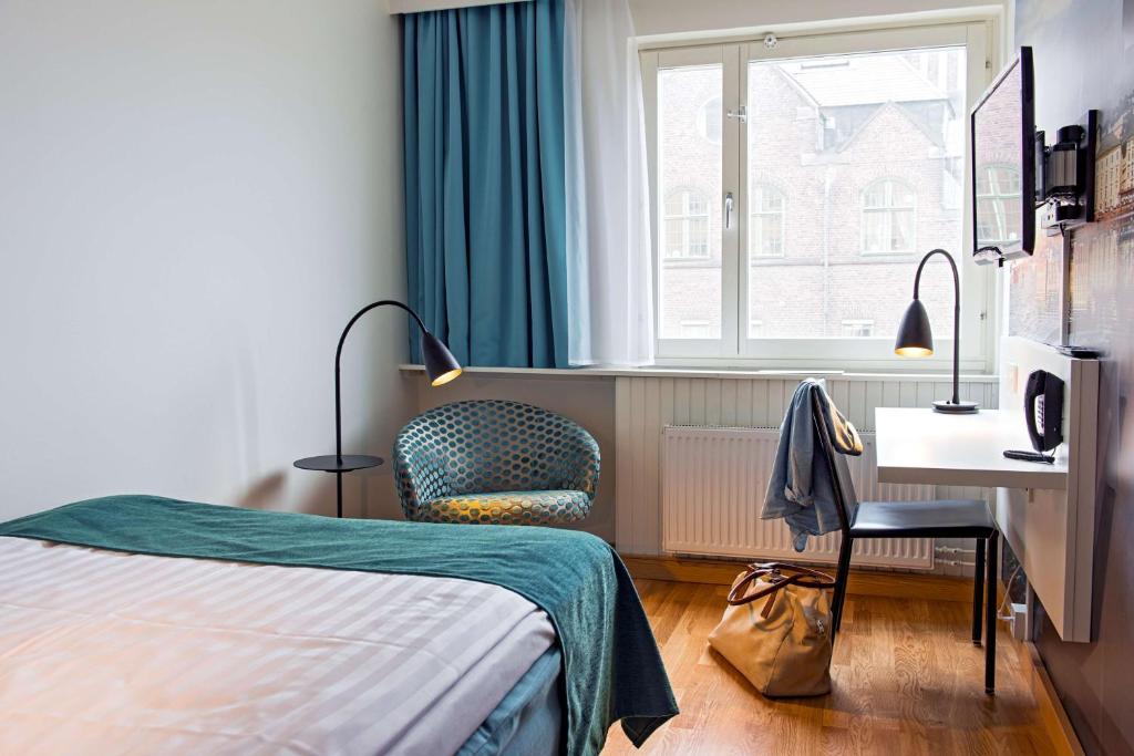 Postel nebo postele na pokoji v ubytování Scandic Sjöfartshotellet