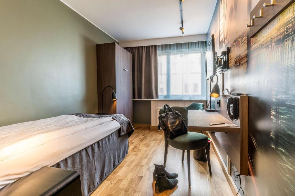 Postel nebo postele na pokoji v ubytování Scandic Sjöfartshotellet