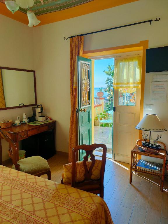Televízia a/alebo spoločenská miestnosť v ubytovaní La Casa Del Sole