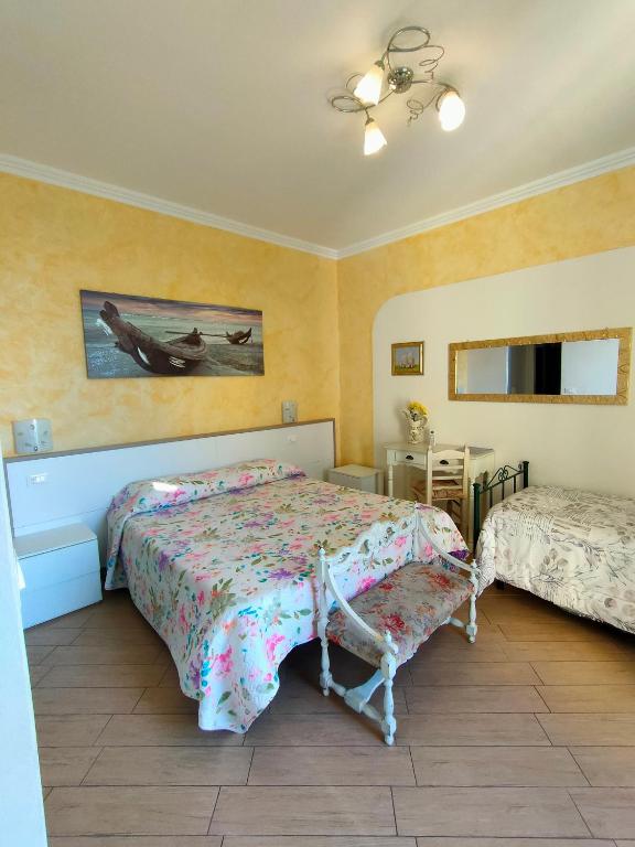 Posteľ alebo postele v izbe v ubytovaní La Casa Del Sole