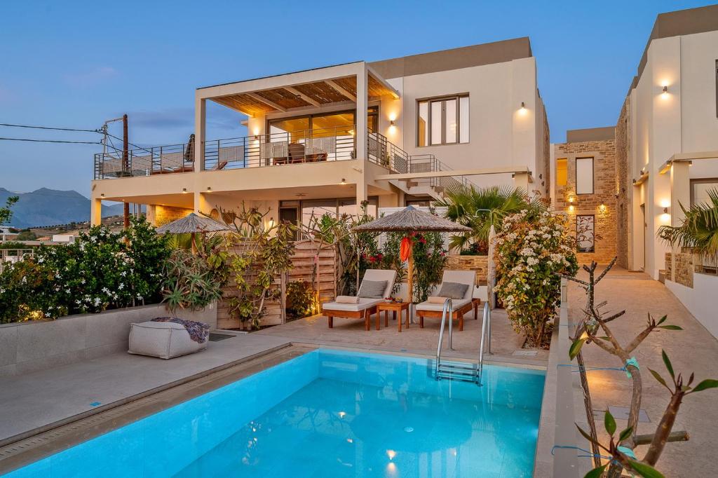 The swimming pool at or close to Ammokrinos Luxury Homes, 150m From Sea