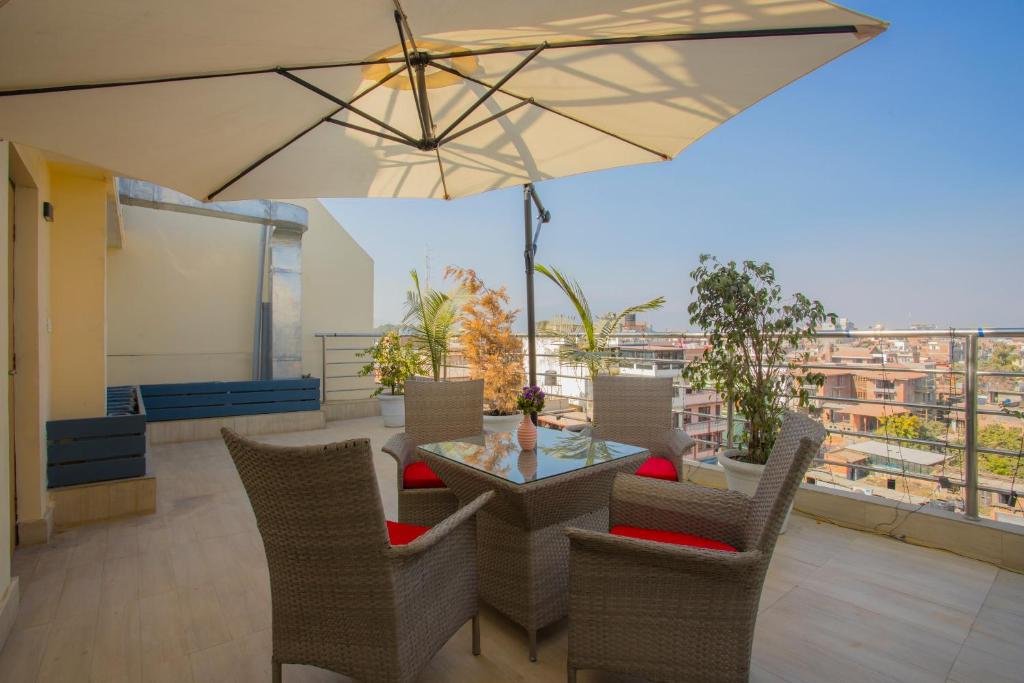 Balkón nebo terasa v ubytování OYO 262 Hotel Kumari
