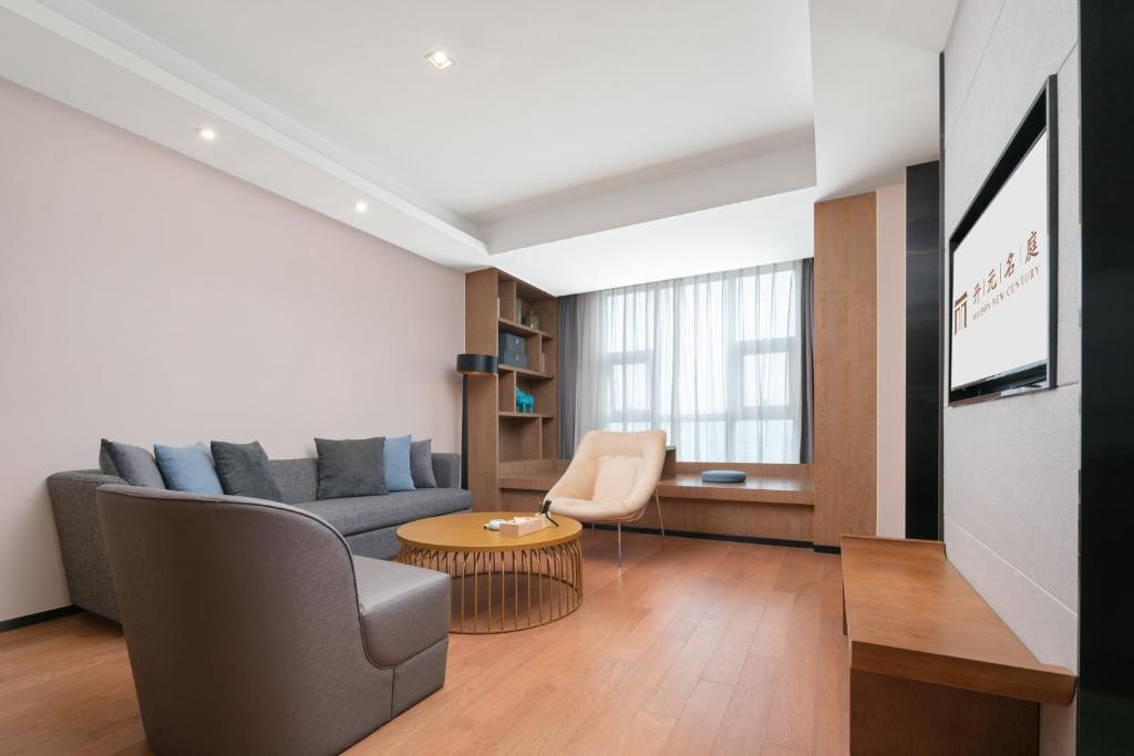 Posezení v ubytování Mansion New Century Hotel Chengdu Wuhou