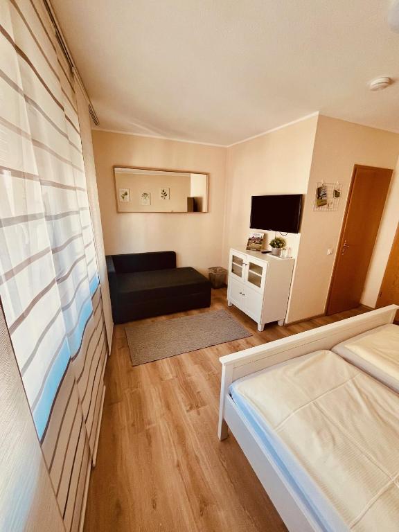 Postel nebo postele na pokoji v ubytování Gasthaus Stammbaum