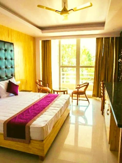 Postel nebo postele na pokoji v ubytování Resort Al Paaine