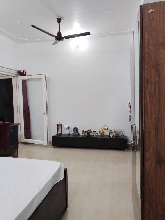 Postel nebo postele na pokoji v ubytování Capsule Home Stay