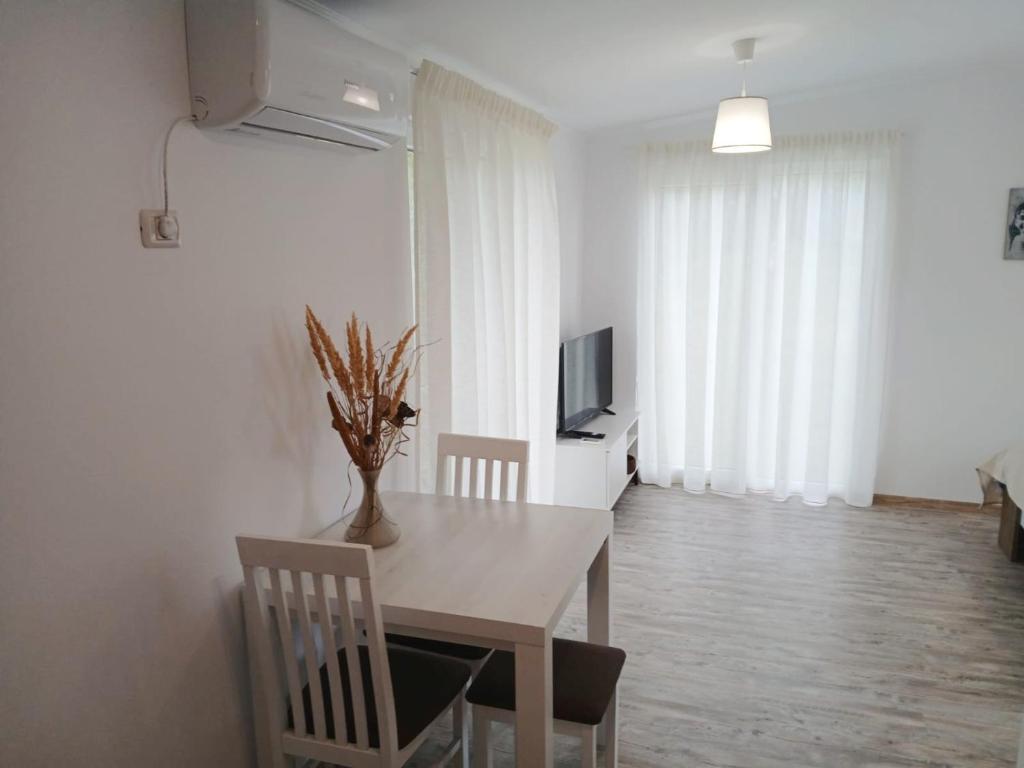 TV a/nebo společenská místnost v ubytování Greci GuestHouse