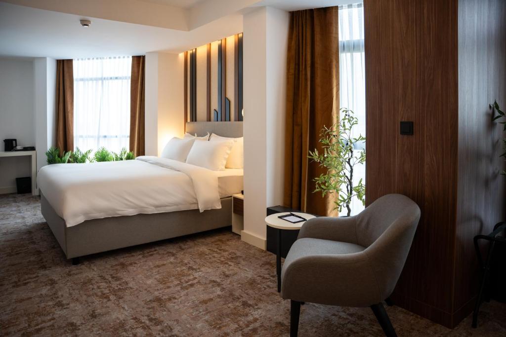 Postel nebo postele na pokoji v ubytování Hotel Rubin DHS