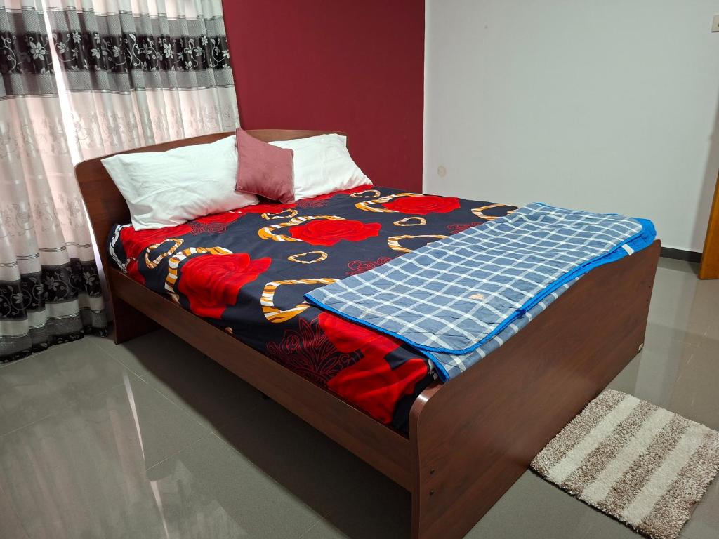 Postel nebo postele na pokoji v ubytování J City Villa