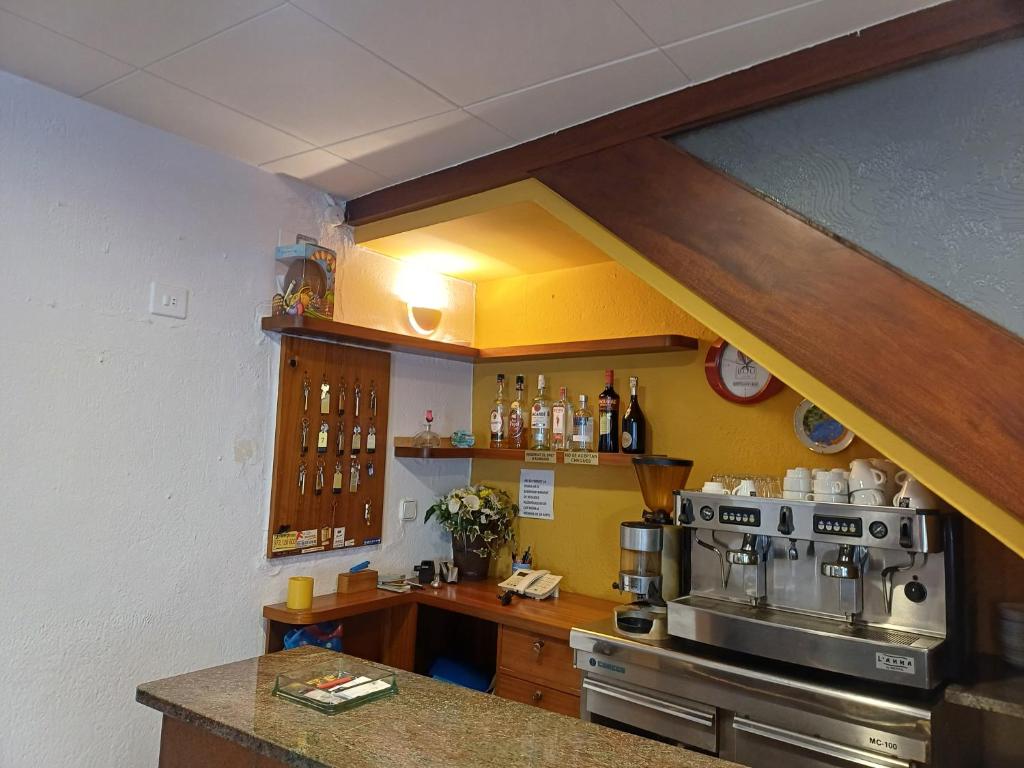 Kuchyň nebo kuchyňský kout v ubytování Hostal Sol i Sombra