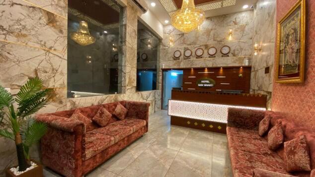 Uma área de estar em Hotel Shiv Shakti
