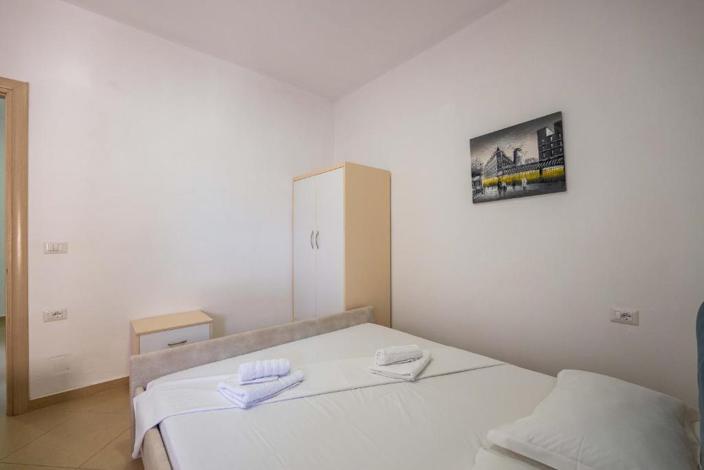 Postel nebo postele na pokoji v ubytování SoleLuna Aparthotel