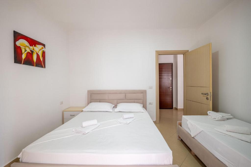 Postel nebo postele na pokoji v ubytování SoleLuna Aparthotel