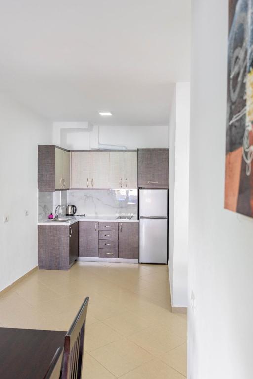 Kuchyň nebo kuchyňský kout v ubytování SoleLuna Aparthotel