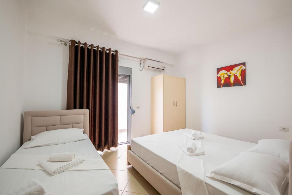 Postel nebo postele na pokoji v ubytování SoleLuna Aparthotel