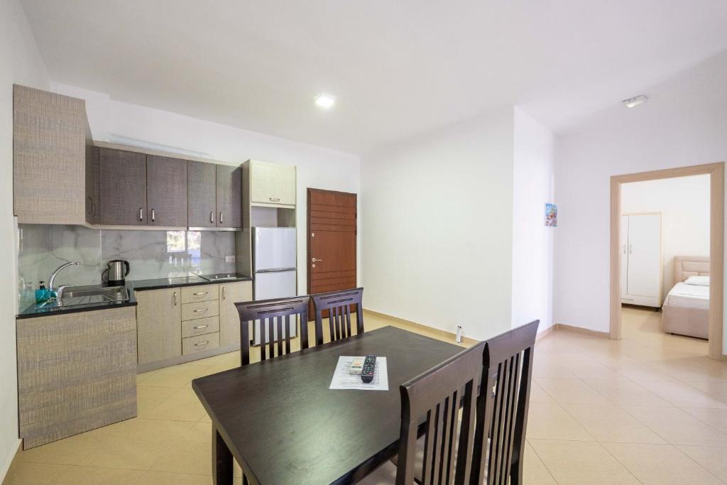 Kuchyň nebo kuchyňský kout v ubytování SoleLuna Aparthotel