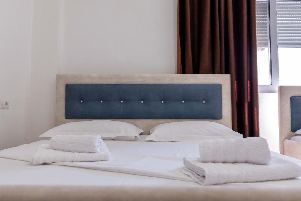 Postel nebo postele na pokoji v ubytování SoleLuna Aparthotel