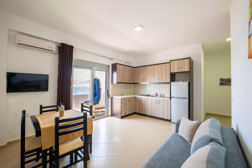 Kuchyň nebo kuchyňský kout v ubytování SoleLuna Aparthotel