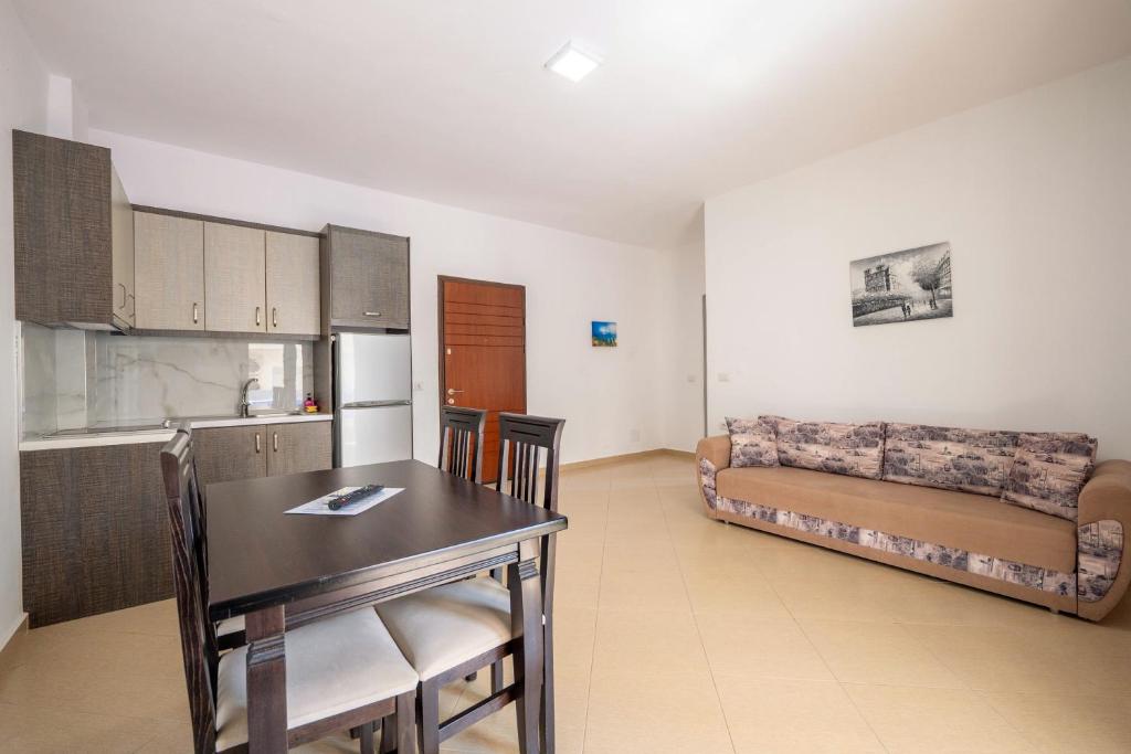 Kuchyň nebo kuchyňský kout v ubytování SoleLuna Aparthotel