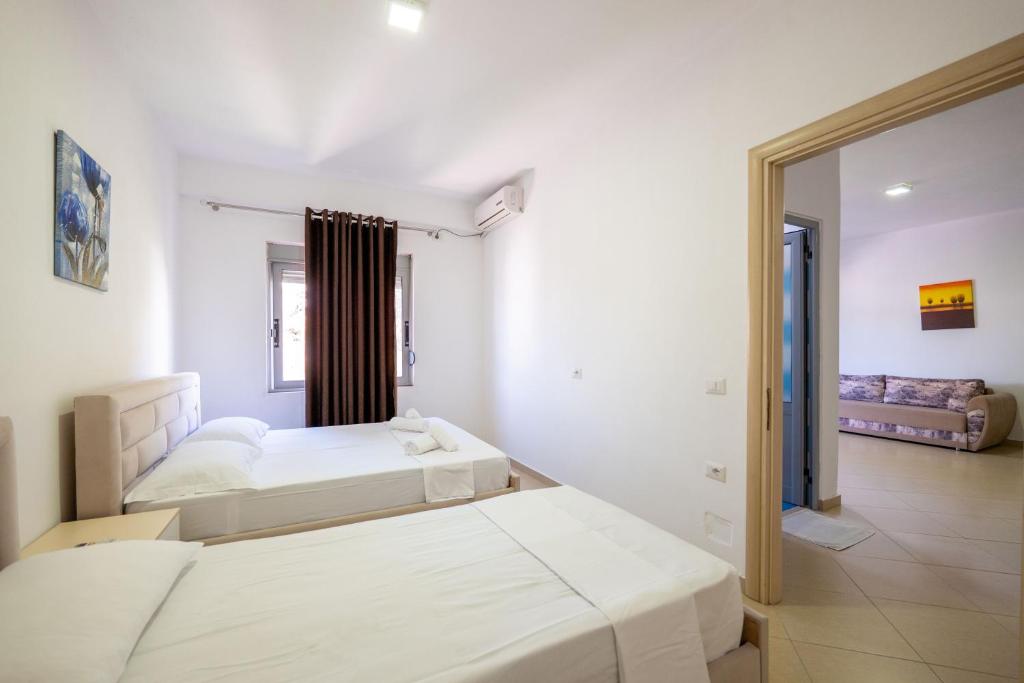 Postel nebo postele na pokoji v ubytování SoleLuna Aparthotel
