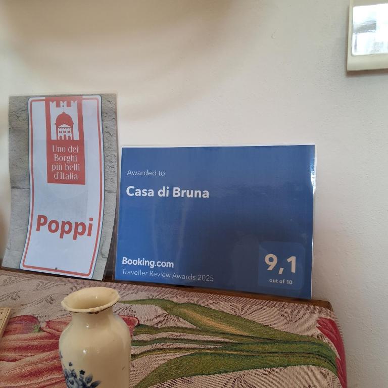 Certifikát, hodnocení, plakát nebo jiný dokument vystavený v ubytování Casa di Bruna