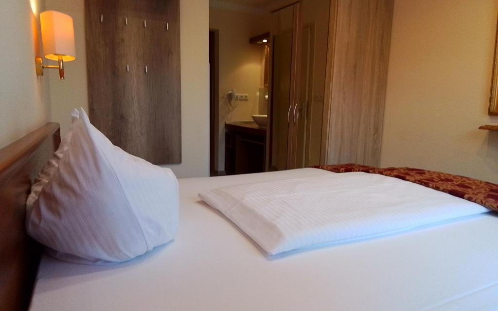 Een bed of bedden in een kamer bij Hotel Beretta