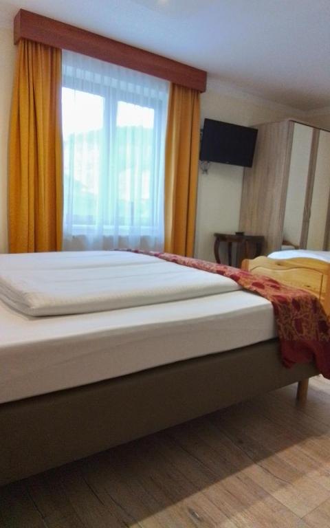Een bed of bedden in een kamer bij Hotel Beretta