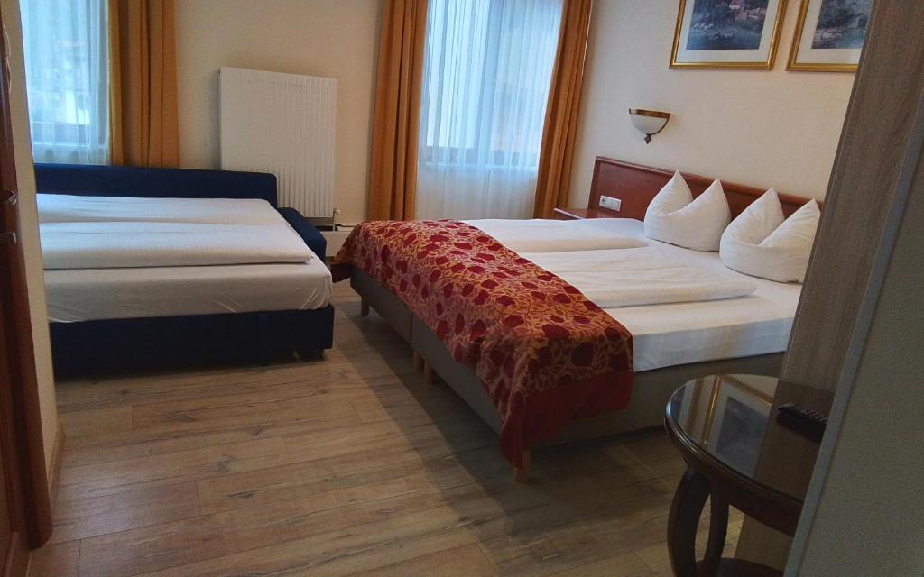 Een bed of bedden in een kamer bij Hotel Beretta