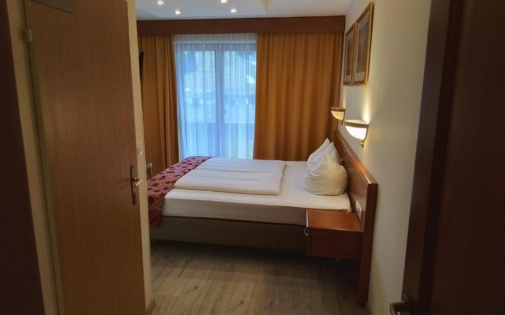 Een bed of bedden in een kamer bij Hotel Beretta