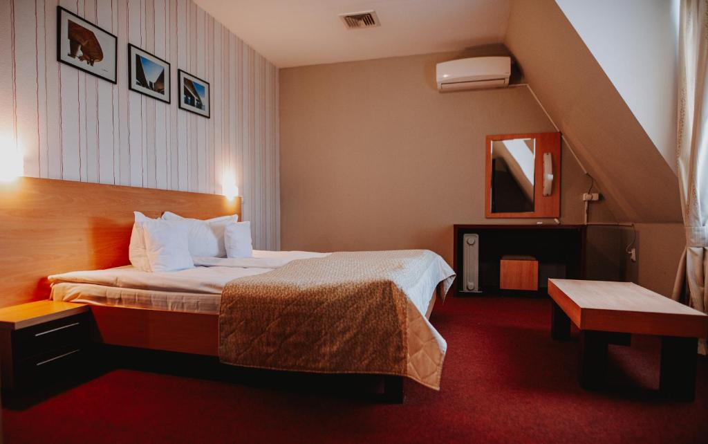 Postel nebo postele na pokoji v ubytování Hotel Concrete