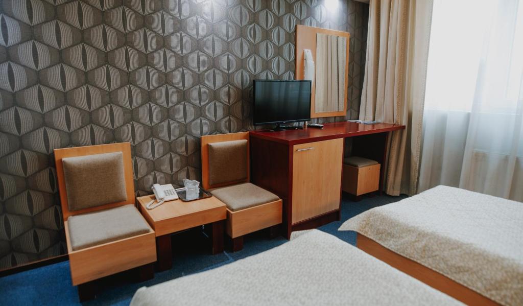 TV a/nebo společenská místnost v ubytování Hotel Concrete