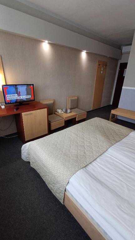 Postel nebo postele na pokoji v ubytování Hotel Concrete