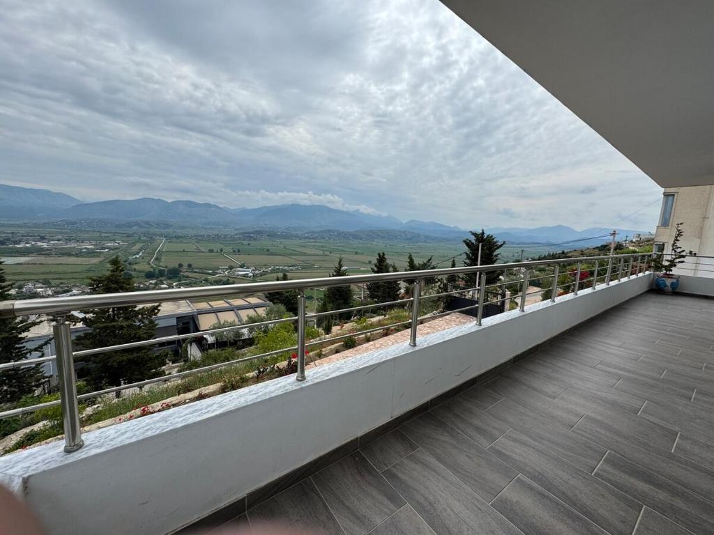 a balcony with a view of the mountains at Sea La View Apartment Saranda in Sarandë