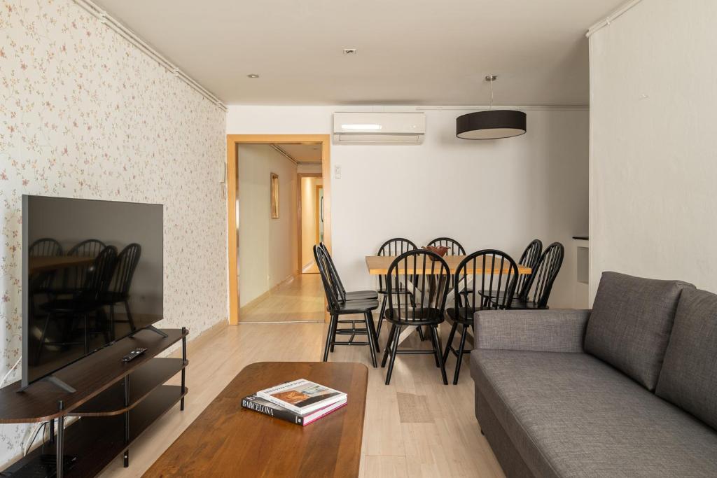 TV a/nebo společenská místnost v ubytování Stay U-nique Apartments Aribau
