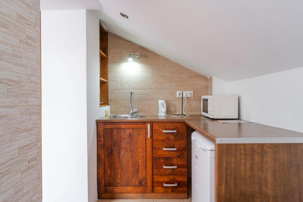 Kuchyň nebo kuchyňský kout v ubytování B&B Konak Sarajevo
