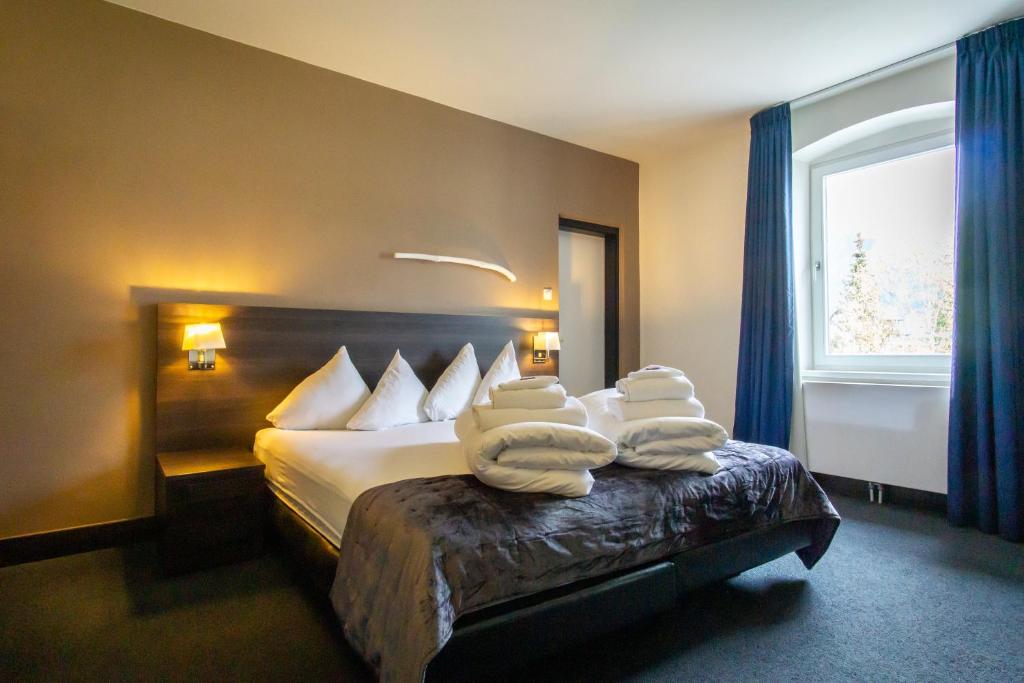 Postel nebo postele na pokoji v ubytování Hotel Wetterstein