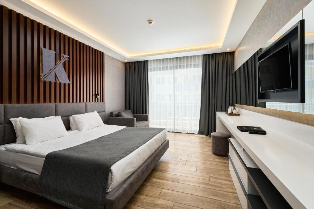 Postel nebo postele na pokoji v ubytování Kaila Beach Hotel - All Inclusive