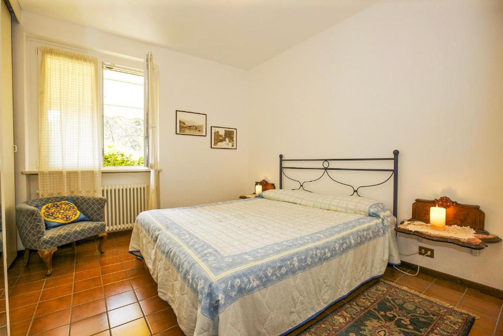 Postel nebo postele na pokoji v ubytování Residenz Roccolo
