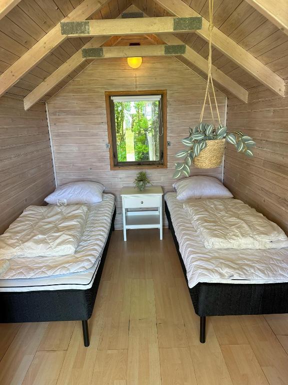 Postel nebo postele na pokoji v ubytování Velling Koller Hotel og Camping