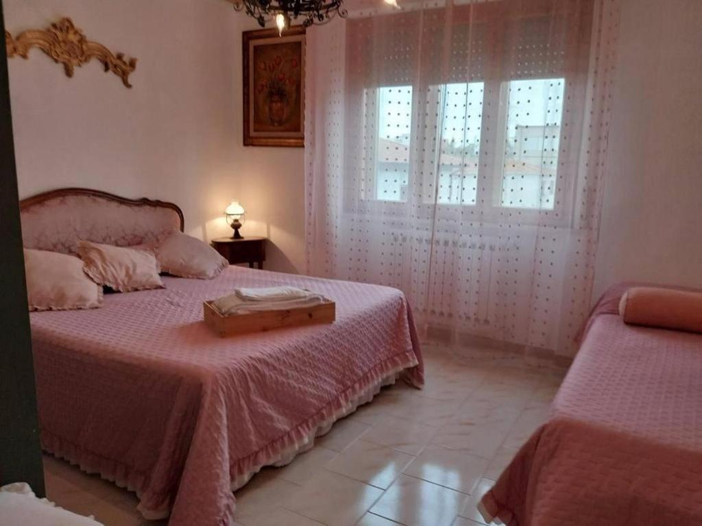 Posteľ alebo postele v izbe v ubytovaní Toscana Grande Appartamento in Villa con 2 camere, terrazze, giardino e posto auto privato Tutti spazi uso esclusivo