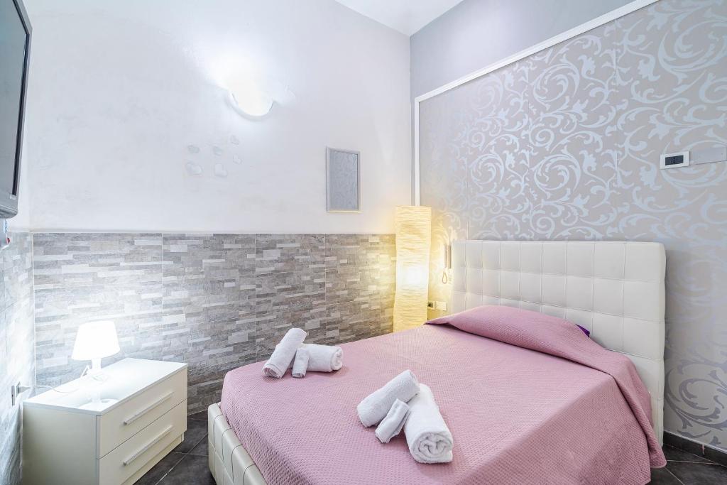 Ένα ή περισσότερα κρεβάτια σε δωμάτιο στο Casa Giorgia