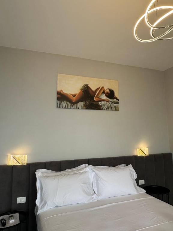 Postel nebo postele na pokoji v ubytování Aloha Villa and Suites